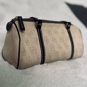 Dooney & Bourke Sand colored purse with Red Interior